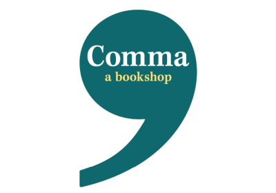 Large dark green comma character with words 'Comma, a bookstore' across it in white an yellow